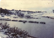 Looking north from dam wall shows the four walkways for the cages, circa 1978