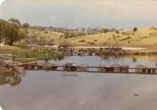 A wall of water from a cloud burst about to hit walkway 4 heavily damaging all walkways, circa 30 Demeber 1980